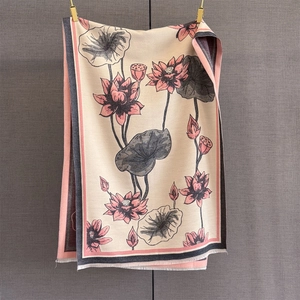 Detail of winter thick pashmina shawl featuring pink lotus embroidery and fringe edges