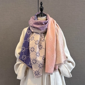 Three-color patchwork clover pattern scarf with short fringe on white coat