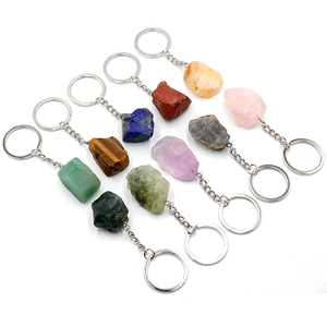 Assorted natural raw crystal stone keychains in quartz amethyst and tiger eye