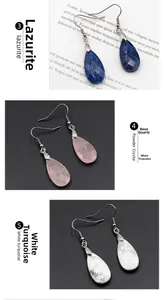 Macro view of teardrop faceted amethyst and lazurite earrings with metal hooks