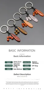 Detailed size specifications for teardrop crystal keychains in various natural stones