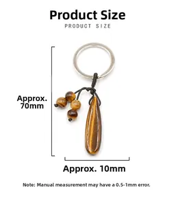 Detailed view of teardrop tiger eye stone keychain with dimensions and bead accents