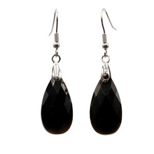 Faceted black teardrop gemstone earrings with silver ear hooks on a white background