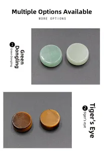 Close-up of polished Green Aventurine and Tiger Eye stone discs with smooth round edges