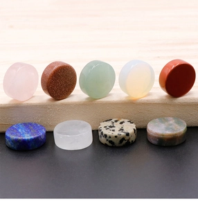 Detailed close-up of colorful round 16mm-20mm natural stone and agate button discs