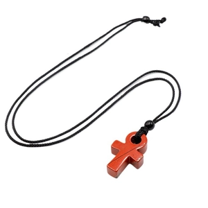 Pendentif Ankh en agate rouge avec cordon noir tressé sur fond blanc minimaliste