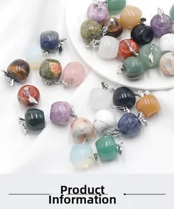 Close-up of various natural crystal apple pendants in diverse colors with silver metal leaves