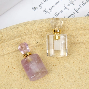 Colgante frasco de perfume de cristal ovalado natural con tapón dorado para aceites esenciales