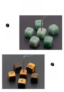 Macro detail of cube-shaped Green Aventurine and Tiger's Eye gemstone incense holders