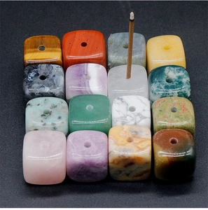 Detailed grid of sixteen natural gemstone incense holders showing diverse textures and colors