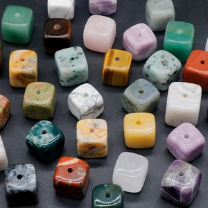 Mix of natural stone incense holders including tiger eye and quartz with center holes