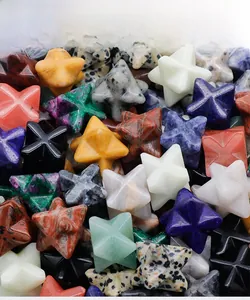 Macro shot of assorted Merkaba star crystals including lapis lazuli and aventurine