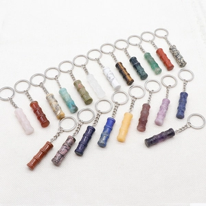 Bamboo shaped natural crystal and gemstone keychains in various colors and textures