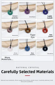 Macro view of various natural crystal donut pendants with handmade woven black cords