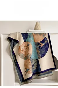 Detailed view of winter cashmere-like shawl with fine jacquard bird and floral patterns