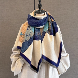 Winter faux cashmere scarf with geometric flower pattern and fringe in blue and cream