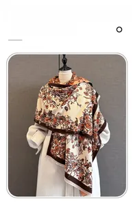 Detail view of imitation cashmere scarf with vintage floral pattern and elegant fringe
