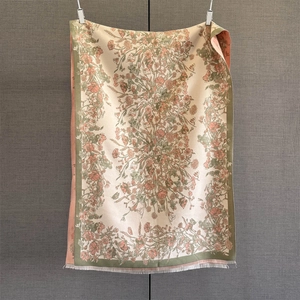 Detailed view of paisley cashmere pashmina shawl showing fine floral prints and fringe