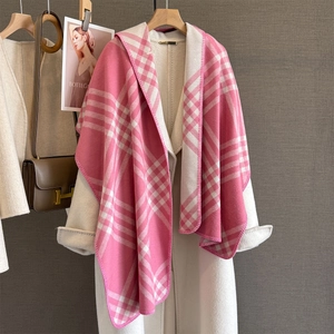 Close-up of pink and white plaid scarf detailing soft texture and edge overlock