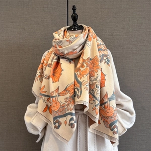Detail of vintage floral pattern and tassel fringe on thick cashmere-feel shawl scarf
