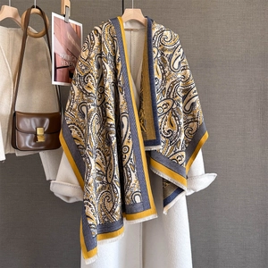 Winter paisley patterned yellow and navy jacquard pashmina shawl with fringe tassels