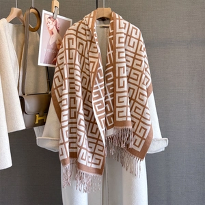 Classic thick cashmere-feel scarf with geometric jacquard pattern and fringe trim