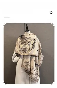 Detail of imitation cashmere scarf with tropical palm tree and zebra print on a mannequin