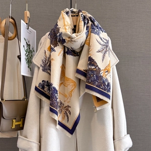 Macro detail of high-quality cashmere texture with zebra and tree prints and fine tassels