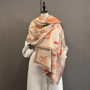 Close-up of tropical palm and zebra print on faux cashmere shawl with fringe