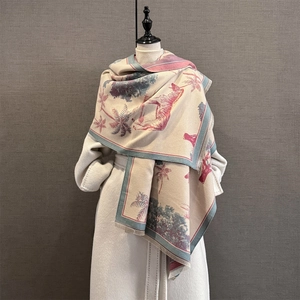 Close-up of vintage animal and tropical palm print on a thick cashmere-like shawl scarf