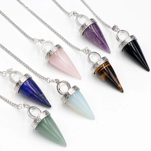 Cone-shaped natural crystal pendants with engraved silver caps in seven vibrant stone colors