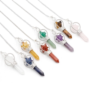 Set of eight hexagonal natural crystal pendants with star shaped metal cages on silver chains