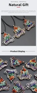 Macro detail of handmade wire-wrapped yoga pendant with seven chakra natural stones