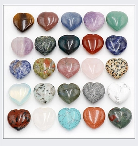 5x5 grid of heart-shaped natural crystal and agate gemstones in various colorful patterns