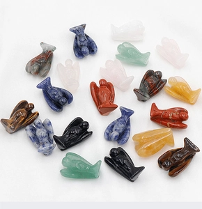 Group shot of varied natural gemstone mini angels including tiger eye and aventurine