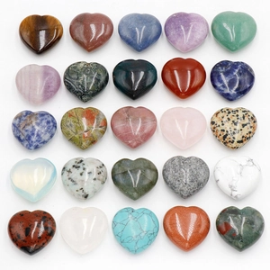 Set of 25 polished heart-shaped natural crystal stones in various colors and patterns