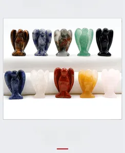 Collection of ten different hand-carved natural crystal mini angel figurines for decoration
