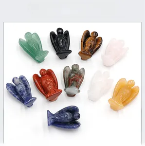 Detailed set of ten hand-carved natural gemstone angel figurines in diverse crystals