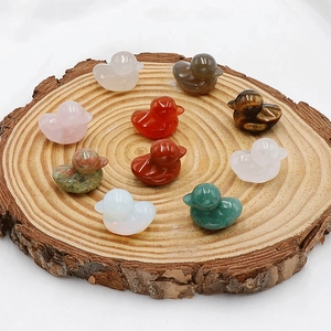 Set of 10 handcrafted mini ducks carved from natural crystals like rose quartz and agate