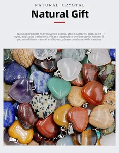 Close-up of 20mm heart-shaped natural crystal pendants in various polished gemstones