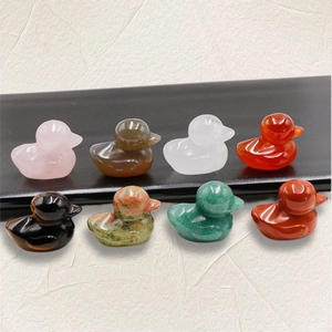 Set of eight carved natural crystal and agate ducks in various colorful stones
