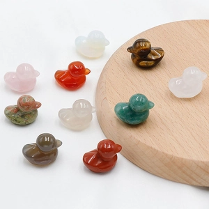 Polished natural crystal duck figurines crafted from tiger eye, quartz, and agate stones