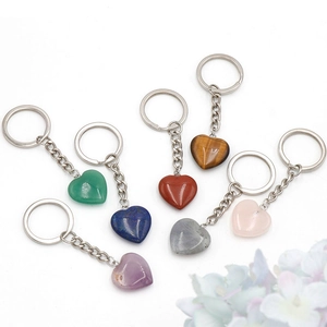 Set of 7 heart-shaped natural stone keychains including amethyst and lapis lazuli