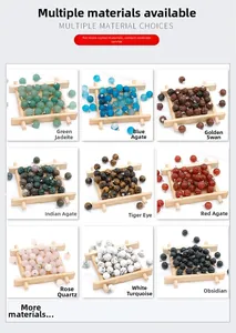 Detailed grid of nine natural stone pumpkin pendants with metallic loops for DIY jewelry