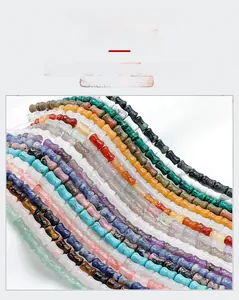 Detailed view of polished natural crystal and agate bamboo-shaped beads for jewelry making