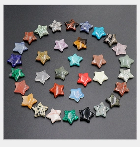 Close-up of polished 20mm natural crystal and semi-precious star-shaped craft stones