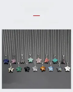 Detailed view of assorted natural crystal necklaces with star-shaped faceted pendants