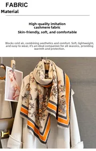 Detail of premium faux cashmere fabric with orange border and butterfly pattern scarf