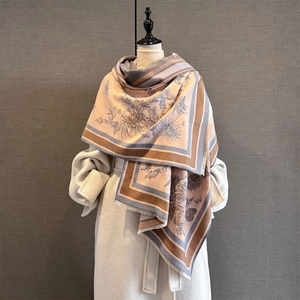 Detail of cashmere-like shawl with butterfly jacquard floral print and fine tassels