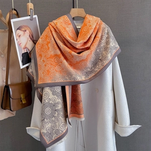 Vintage paisley print shawl in orange and grey color block with fringe details